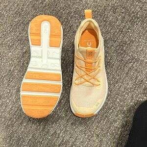 On Running Peach and Beige Athletic Shoes